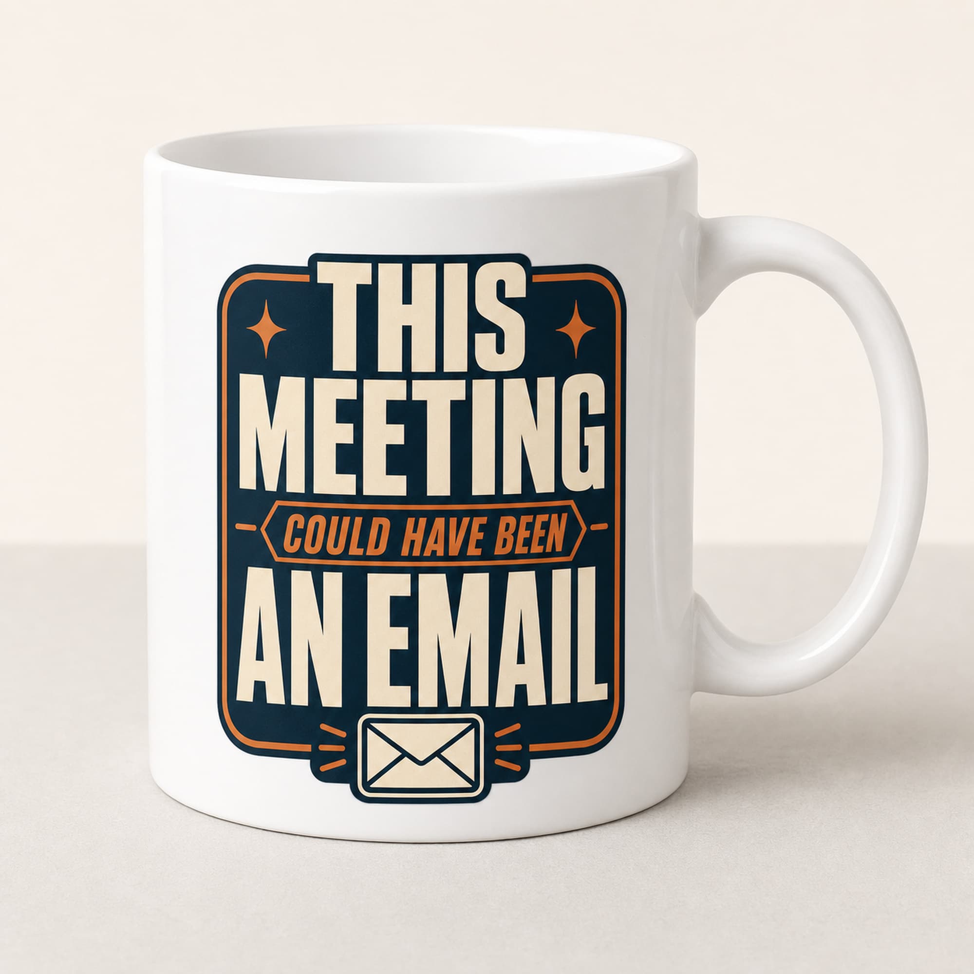 White ceramic mug featuring the retro phrase This Meeting Could Have Been an Email in navy, ivory, and orange.